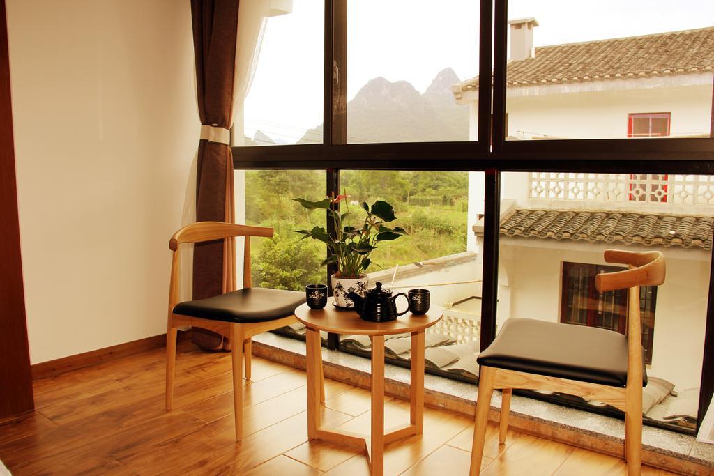 The Flower Hotel Guilin Rum bild