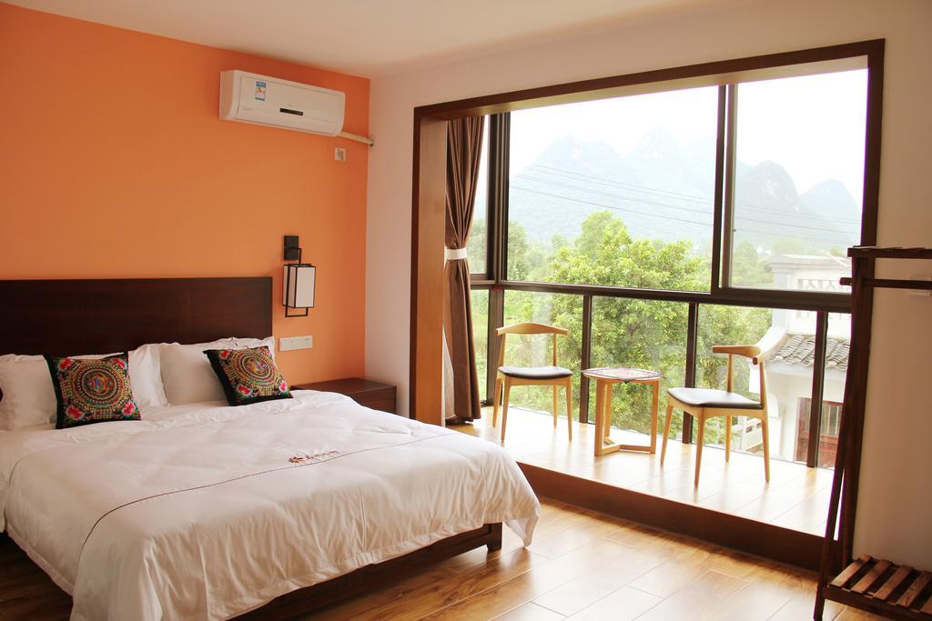 The Flower Hotel Guilin Rum bild