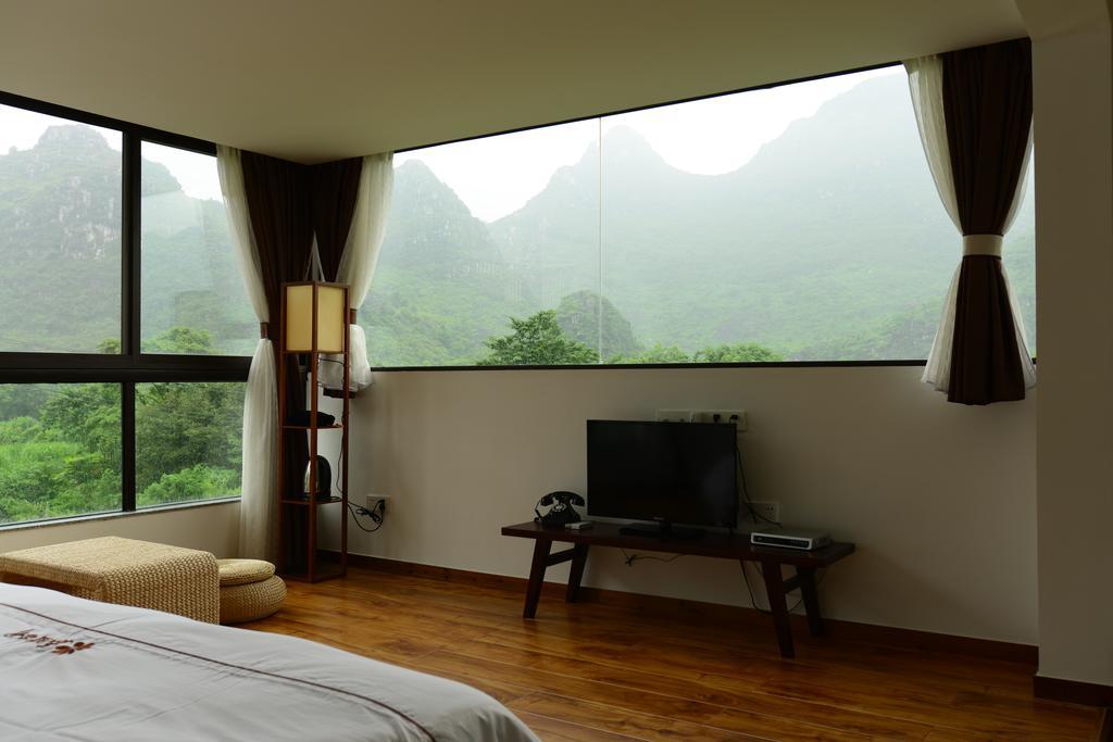 The Flower Hotel Guilin Rum bild