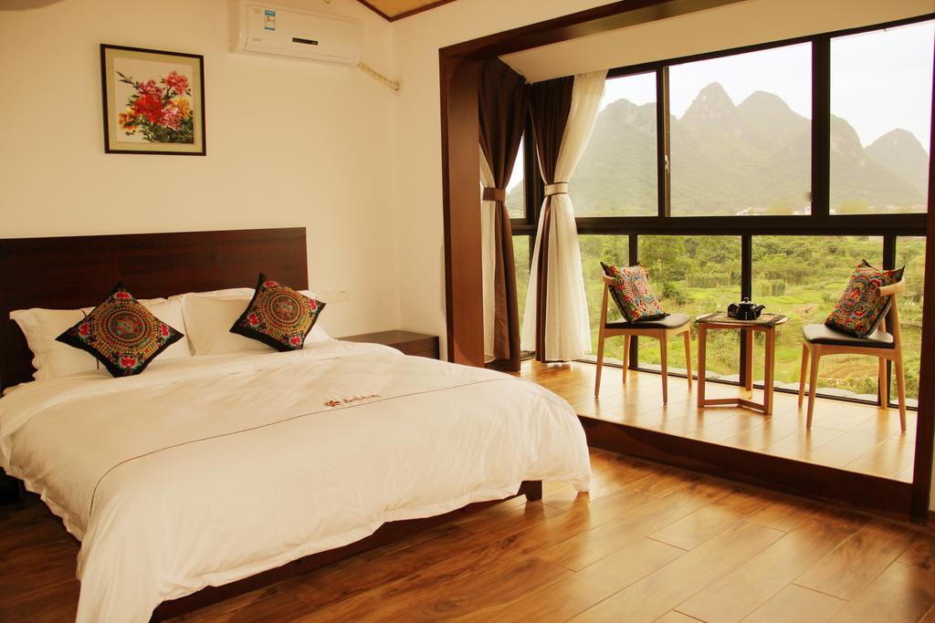 The Flower Hotel Guilin Rum bild