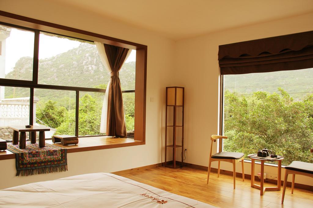 The Flower Hotel Guilin Rum bild