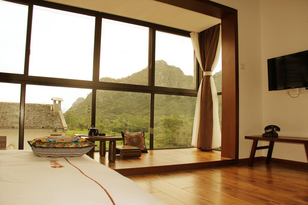 The Flower Hotel Guilin Rum bild